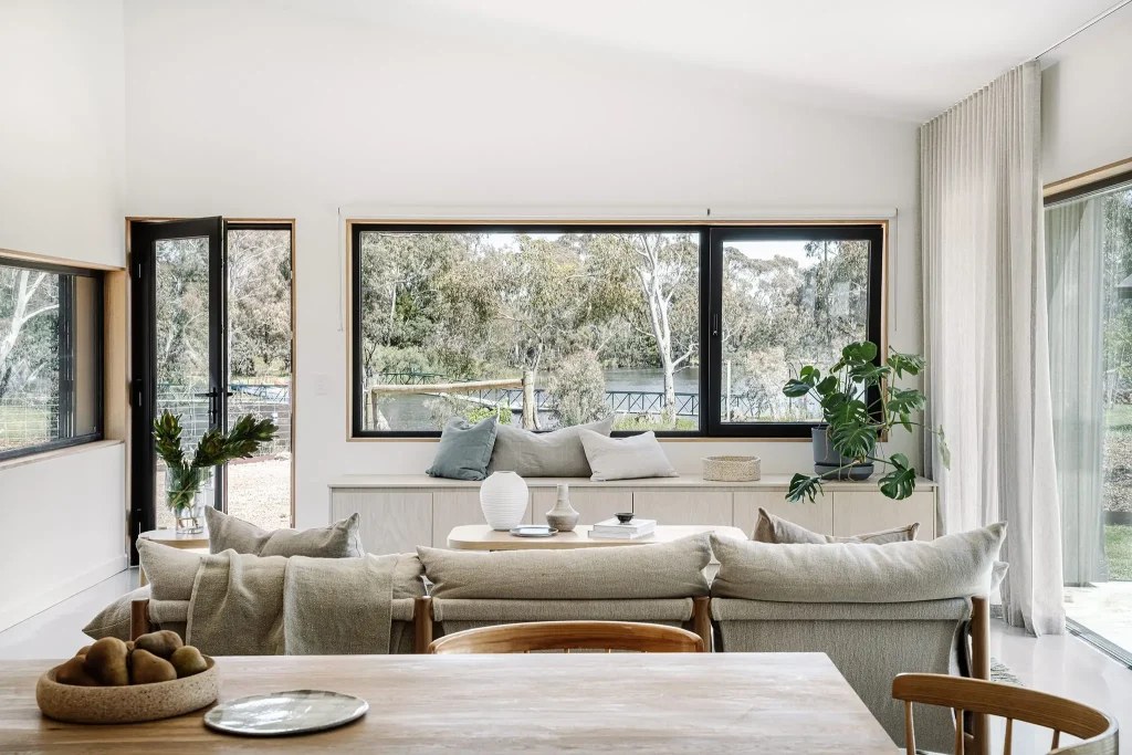 Bright living room with large new energy-efficient windows